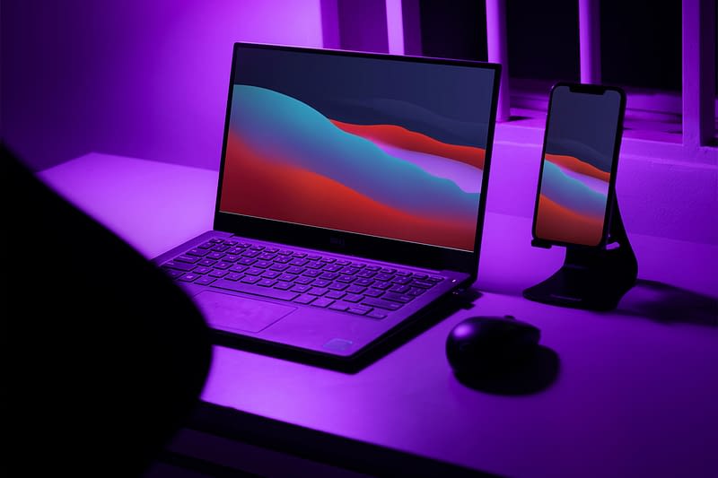 Laptop and phone on a desk