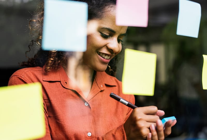 Woman taking notes
